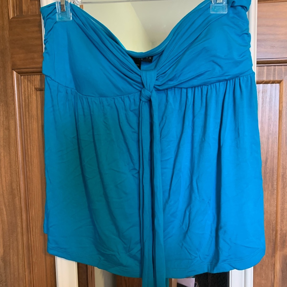 Women’s strapless blue top with neck tie rubber grip and bra area pads built in